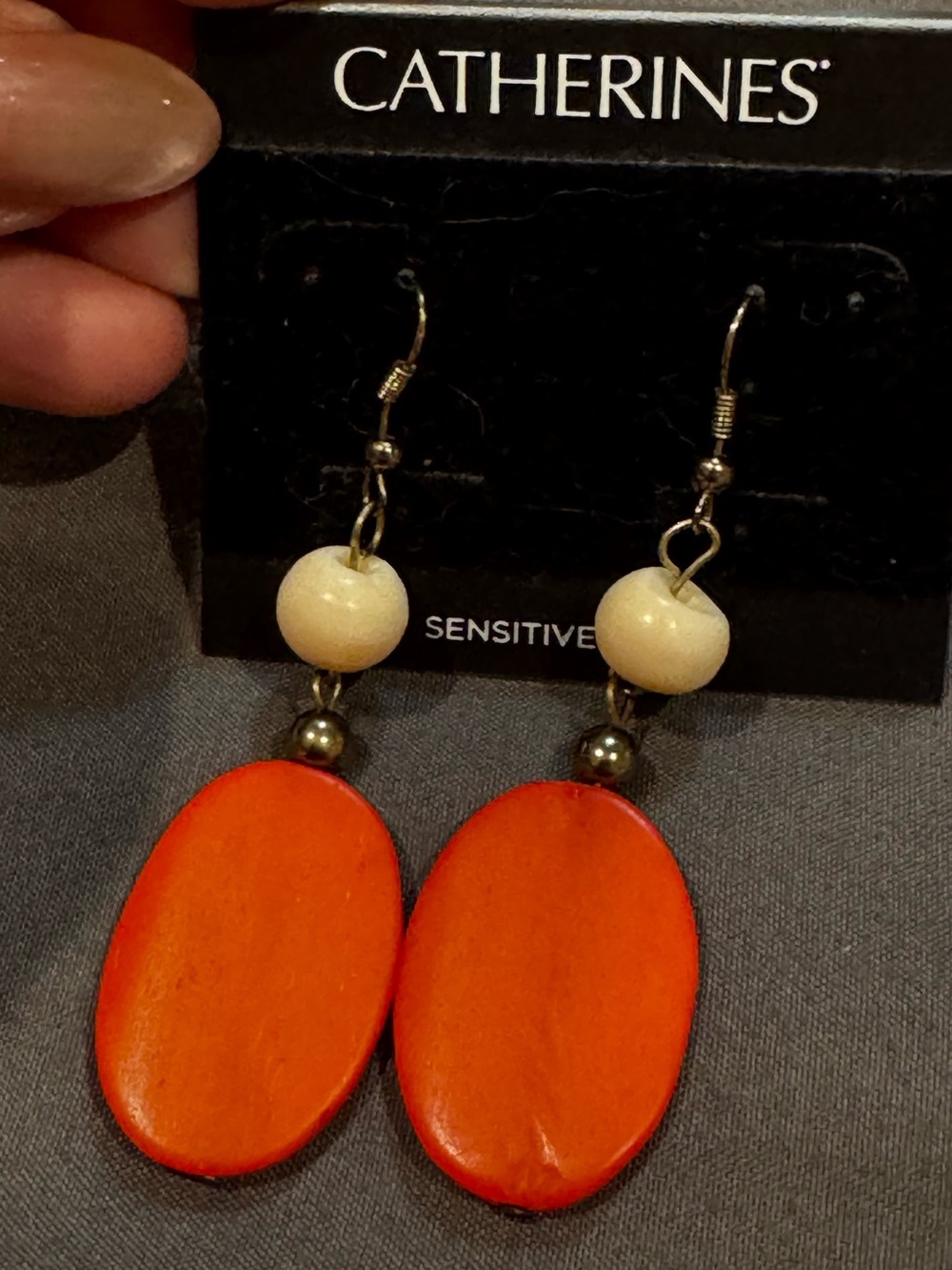 Catherines Orange Oval Drop Earrings with Cream Bead